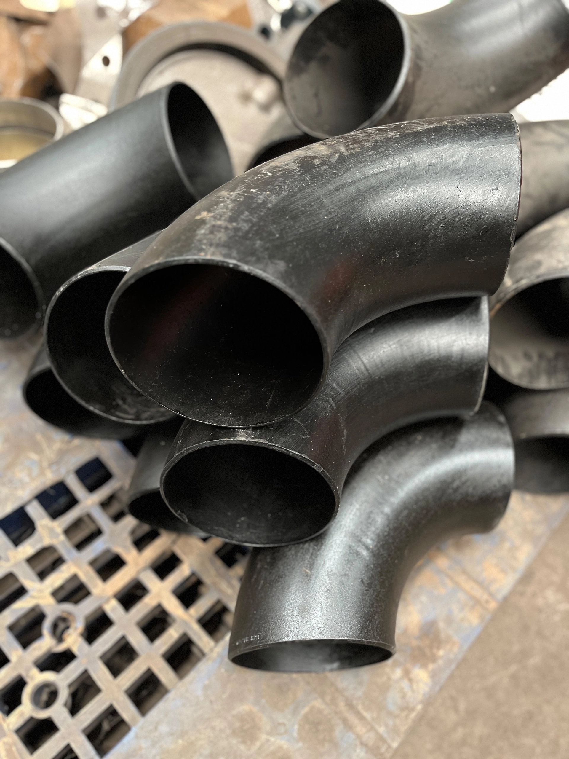 Four-inch carbon steel 90-degree pipe elbow