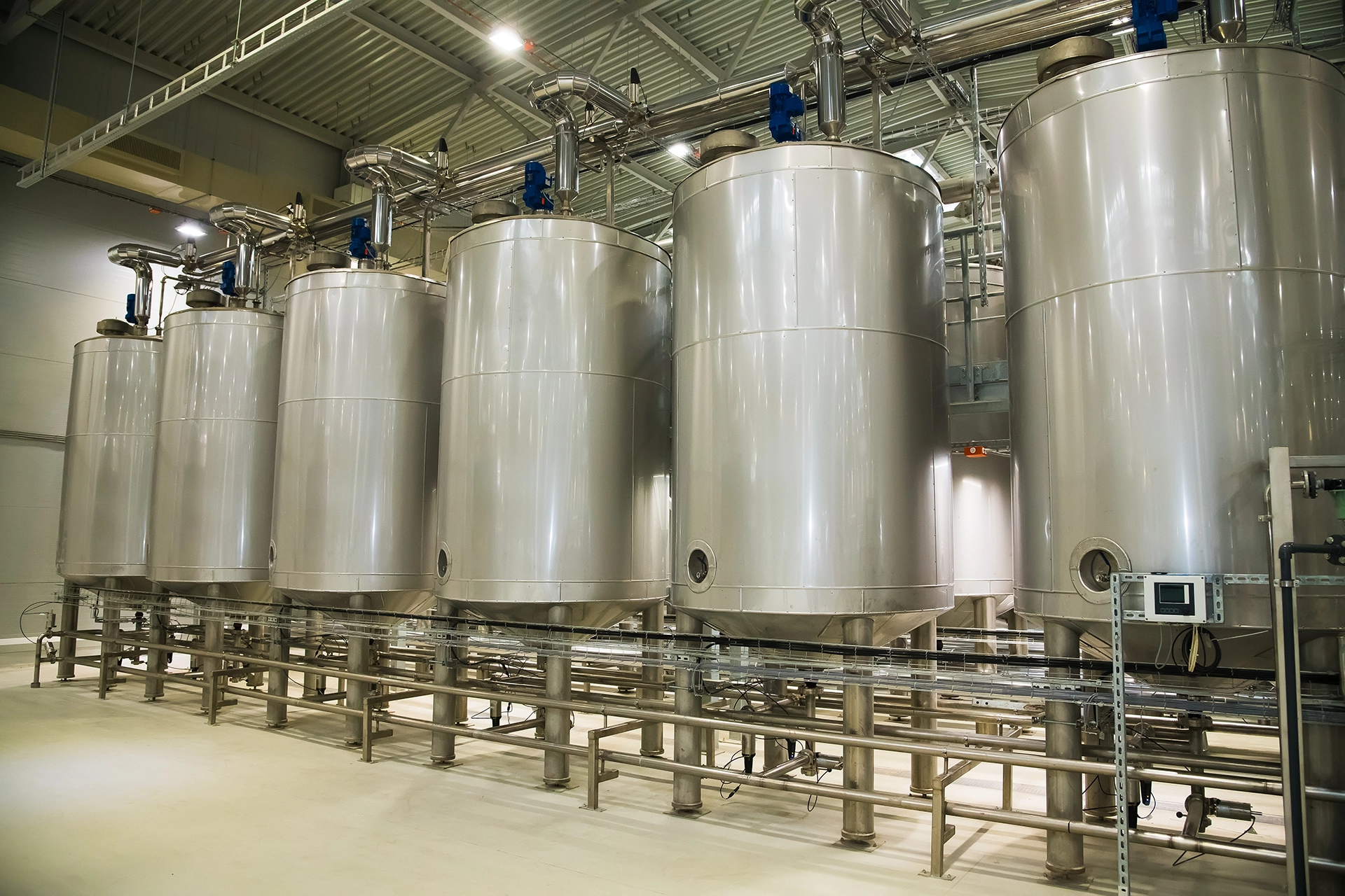 Industrial piping and processing equipment inside a grain processing facility
