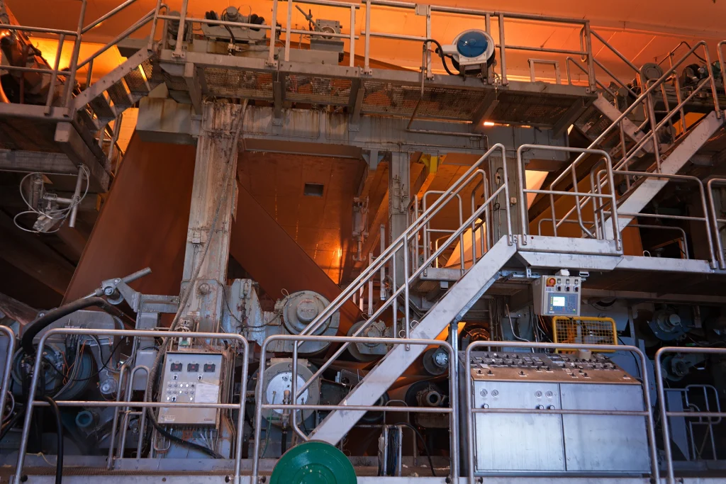 Industrial equipment and piping inside a pulp and paper mill